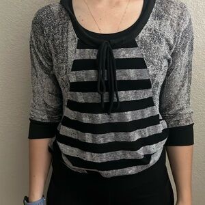 Black and grey 3/4 sleeved shirts w/hood came from buckle size M